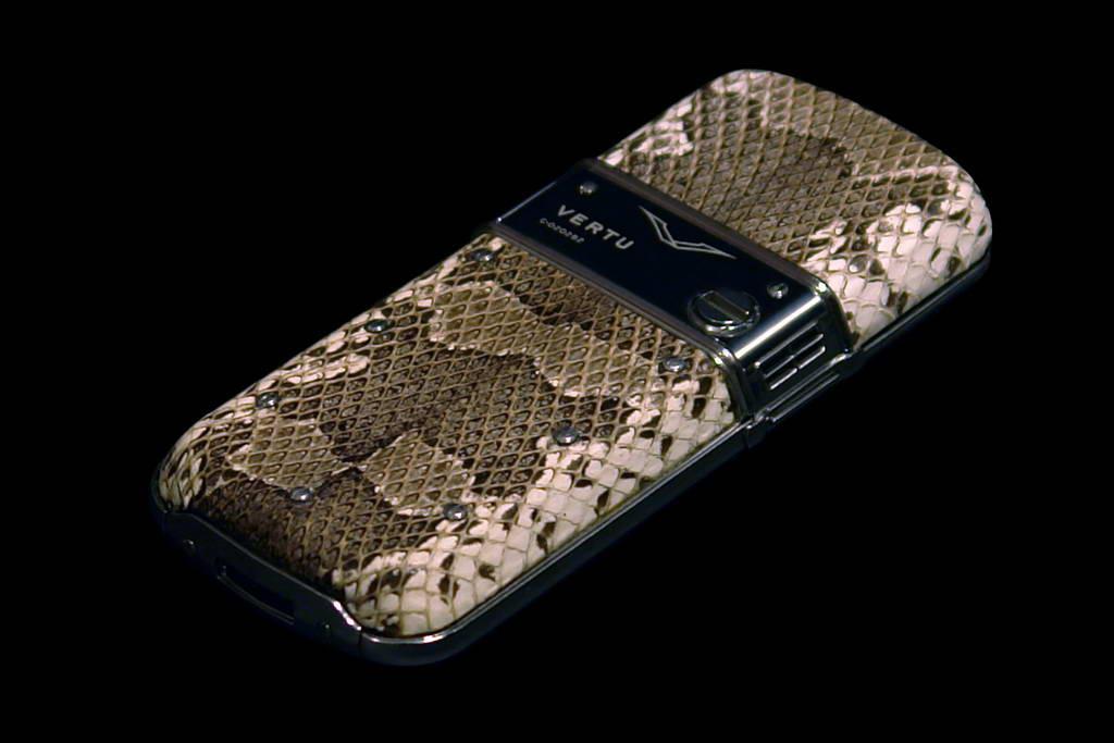 VERTU CONSTELLATION EXOTIC LEATHER LIMITED EDITION by MJ VIP Mobile Phone Black Gold. Genuine Leather - Python Skin. Inlaid Jeweler Gems.